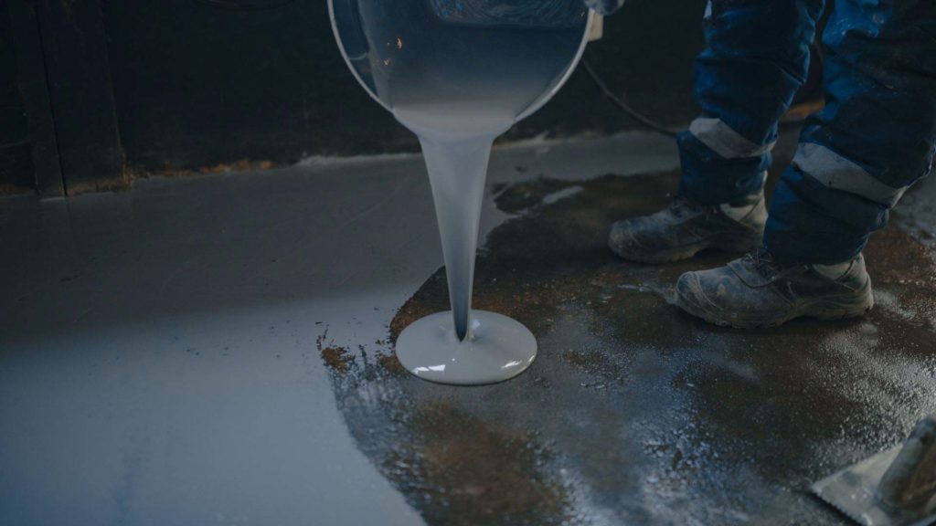 Glossy epoxy-coated driveway surface with a smooth, durable finish in Toowoomba